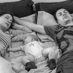 Mom and Dad co-sleeping with baby.